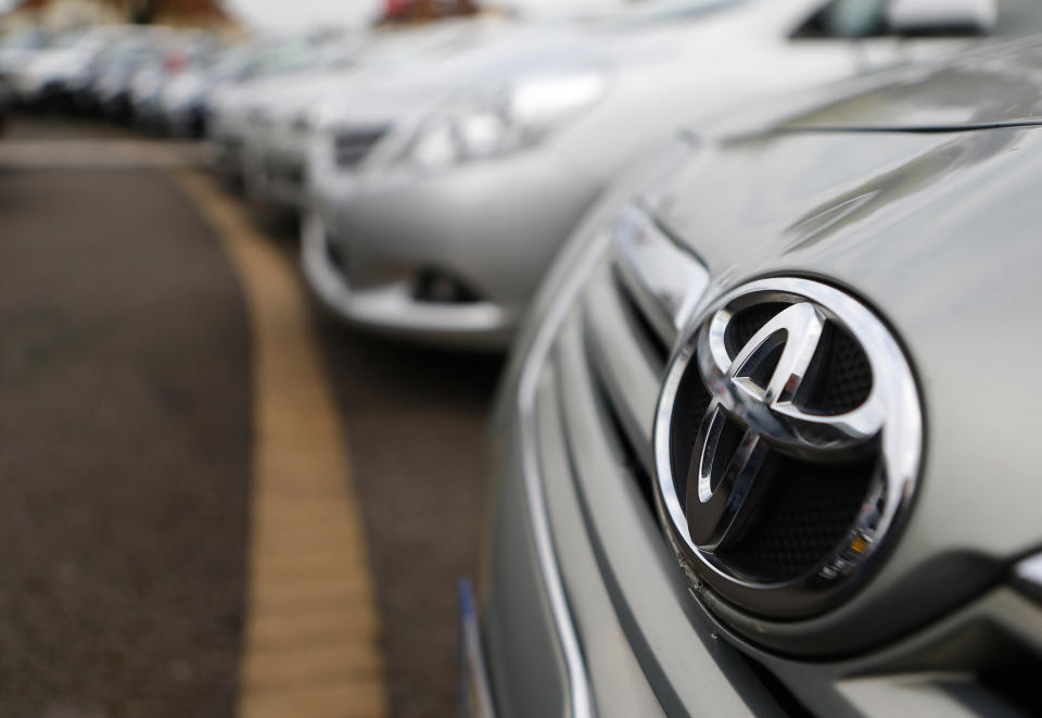 Toyota cars are lined up for sale on the forecourt of a Toyota dealer in Purley, south London, October 10, 2012. Toyota Motor Corp said it would recall more than 7.4 million vehicles worldwide as a faulty power window switch was a potential fire hazard, the latest in a series of setbacks that have dented the reputation of Japan's biggest automaker.  REUTERS/Andrew Winning (BRITAIN - Tags: TRANSPORT BUSINESS)