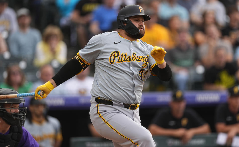 Pittsburgh Pirates' Rowdy Tellez watches a single off Colorado Rockies starting pitcher Ryan Feltner during the first inning of a baseball game Friday, June 14, 2024, in Denver. (AP Photo/David Zalubowski)