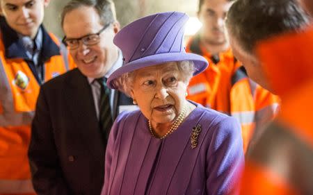 Britain's Queen Elizabeth attends the formal unveiling of the new logo for Crossrail, which is to be named the Elizabeth line, at the construction site of the Bond Street station in central London, February 23, 2016. REUTERS/Richard Pohle/Pool