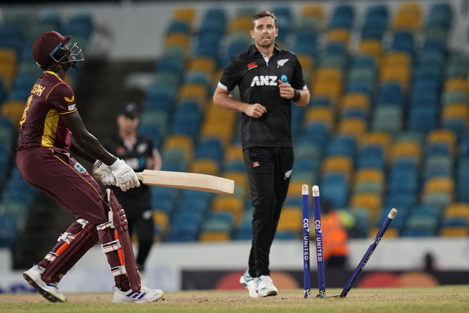 West Indies' Alzarri Joseph is bowled by New Zealand's Tim Southee during the second ODI at Kensington Oval in Bridgetown, Barbados, Friday, Aug. 19, 2022. (AP Photo/Ramon Espinosa)