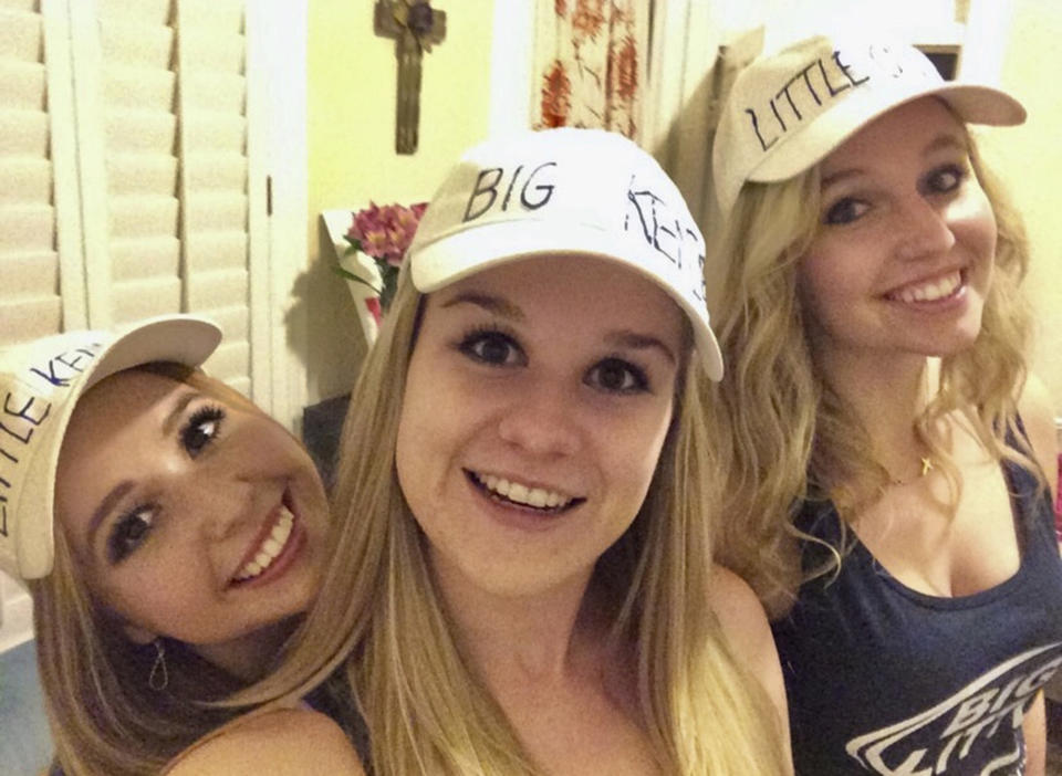 This undated photo provided by Kennedy Stoner shows herself, from left, posing with Mackenzie Lueck and Grace Peterson. Friends and mourners planned to remember Lueck, a Utah college student, Monday night who was missing for nearly two weeks before police arrested a man accused of killing her and burying her charred remains in his backyard. (Courtesy of Kennedy Stoner via AP)