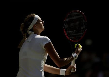 Petra Kvitova of the Czech Republic serves during her match against Jelena Jankovic of Serbia at the Wimbledon Tennis Championships in London, July 4, 2015. REUTERS/Henry Browne