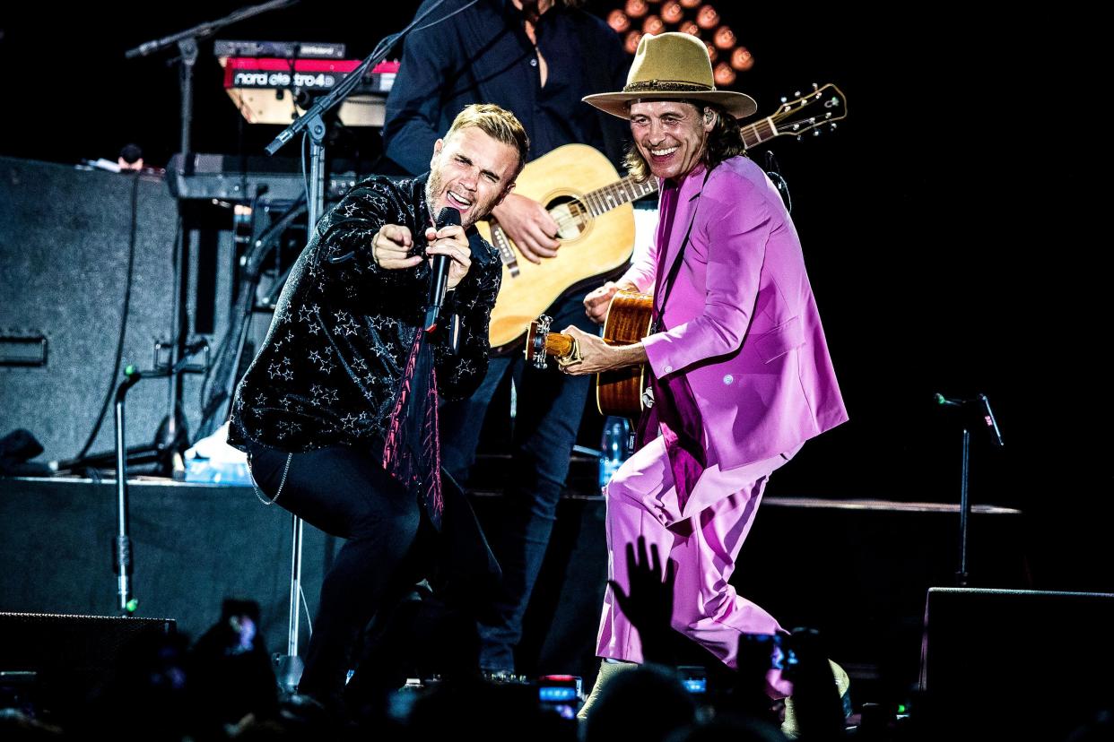 Copenhagen, Denmark. 21st, June 2019. The English pop group Take That performs a live concert at K.B. Hallen in Copenhagen. Here singer and musician Gary Barlow (L) is seen live on stage with Mark Owen (R). (Photo credit: Gonzales Photo - Lasse Lagoni).