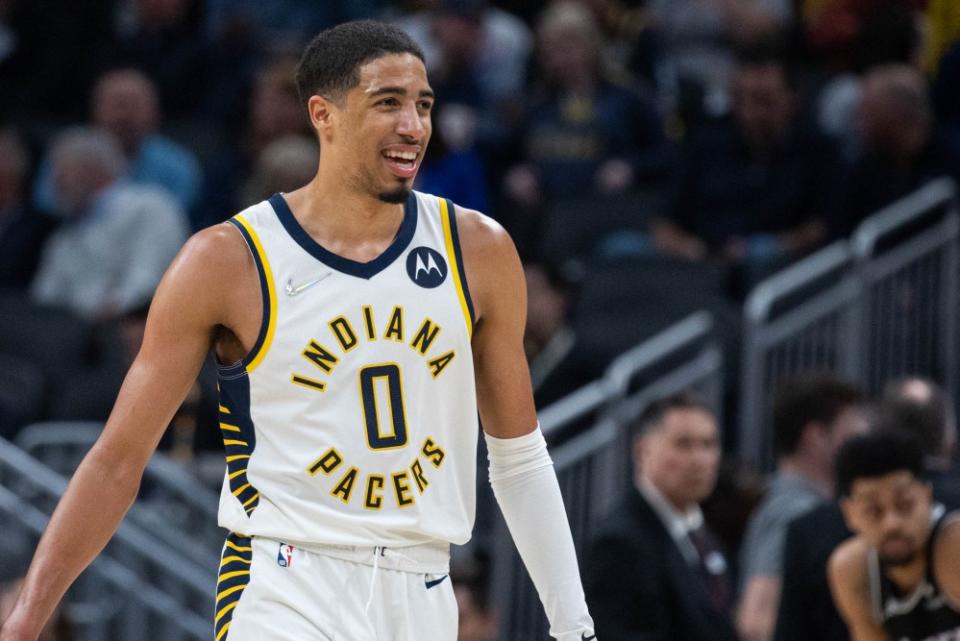 Tyrese Haliburton smiles during a game