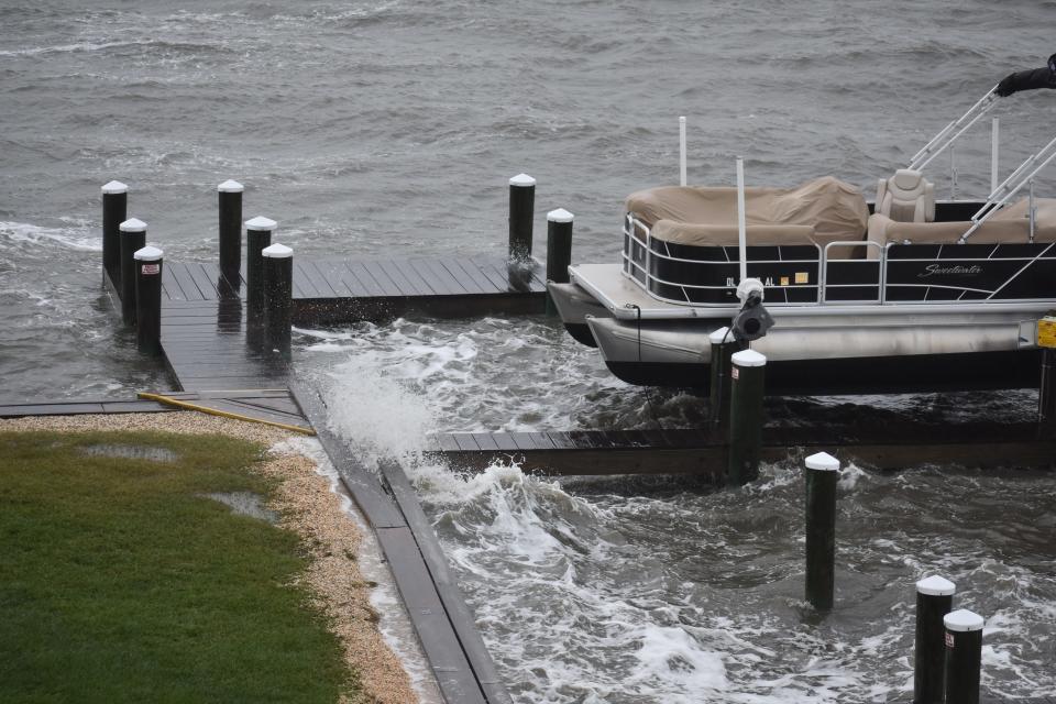 Rising bay water on 94th St. in Ocean City, Md., on Monday, Oct. 3.