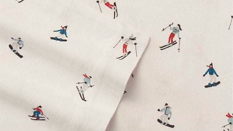 The Eddie Bauer Flannel Sheet Set comes in a variety of patterns, including this one featuring tiny skiers.