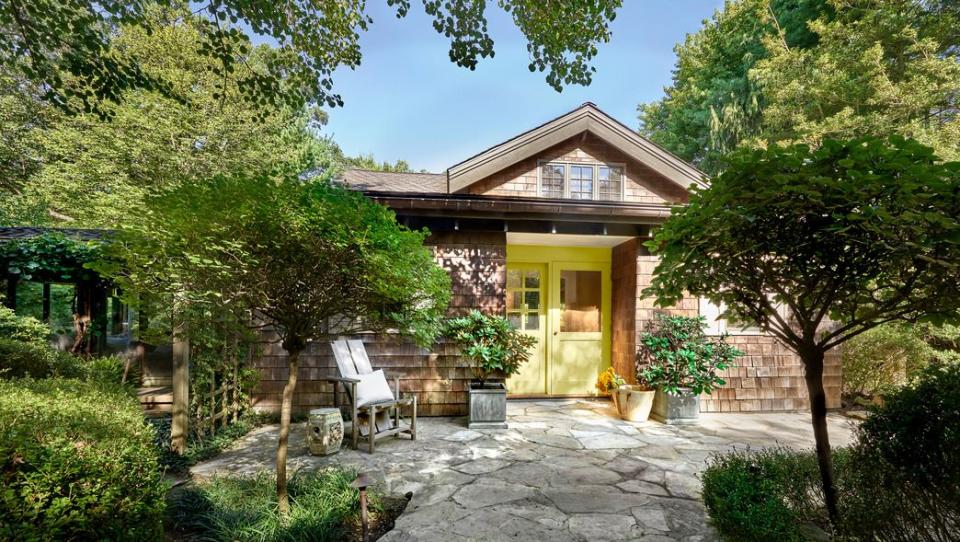 a house with a stone patio