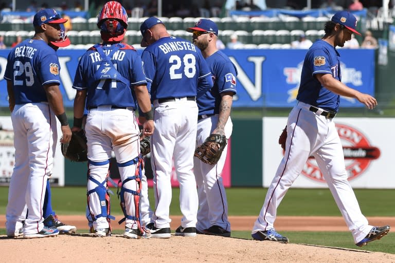 Yu Darvish of the Texas Rangers leaves the spring training game in the third inning against the Colorado Rockies, in Surprise, Arizona, on March 7, 2017