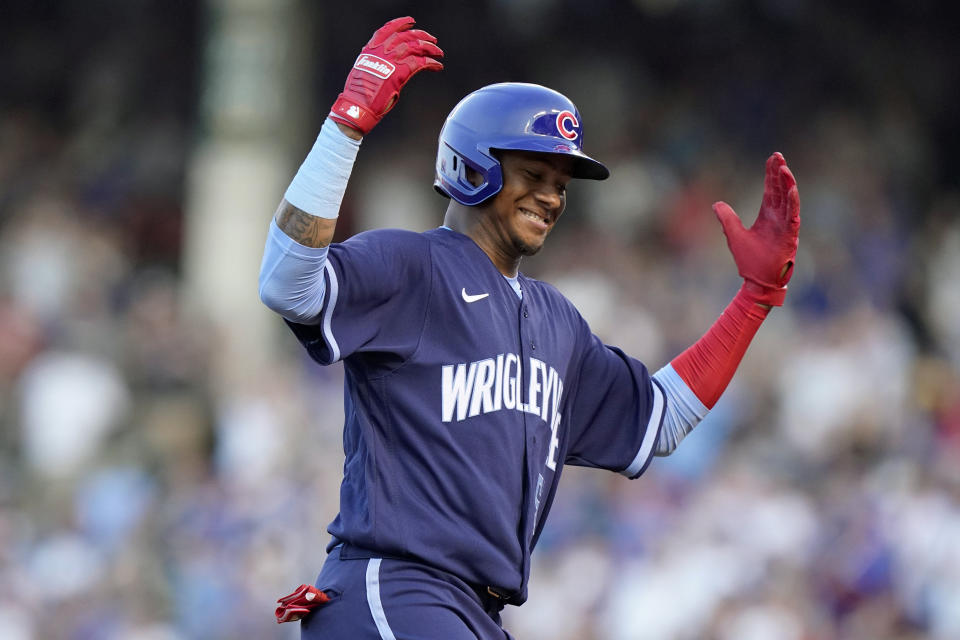 Chicago Cubs' Sergio Alcantara celebrates after hitting a solo home run during the third inning of the team's baseball game against the St. Louis Cardinals in Chicago, Saturday, June 12, 2021. (AP Photo/Nam Y. Huh)