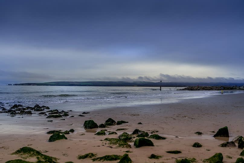 A cold Autumn morning on the beach on Sandbanks Beach, Poole.