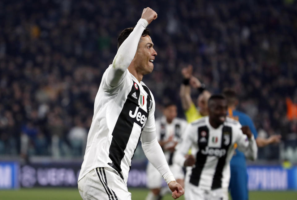 Juventus' Cristiano Ronaldo celebrates after scoring his side's second goal during the Champions League round of 16, 2nd leg, soccer match between Juventus and Atletico Madrid at the Allianz stadium in Turin, Italy, Tuesday, March 12, 2019. (AP Photo/Antonio Calanni)