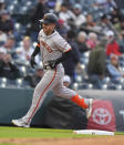 San Francisco Giants' Michael Conforto circles the bases after hitting a solo home run off Colorado Rockies starting pitcher Peter Lambert during the second inning of a baseball game Wednesday, May 8, 2024, in Denver. (AP Photo/David Zalubowski)