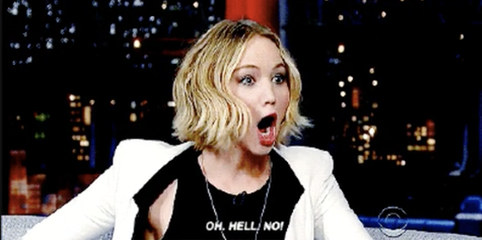 Jennifer Lawrence appears surprised during a talk show interview, mouth open, with caption "OH. HELL. NO!"