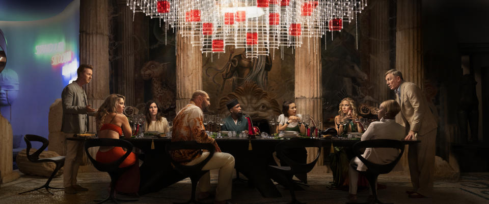 From left, Edward Norton, Madelyn Cline, Kathryn Hahn, Dave Bautista, Leslie Odom Jr., Jessica Henwick, Kate Hudson, Janelle Monáe, and Daniel Craig.