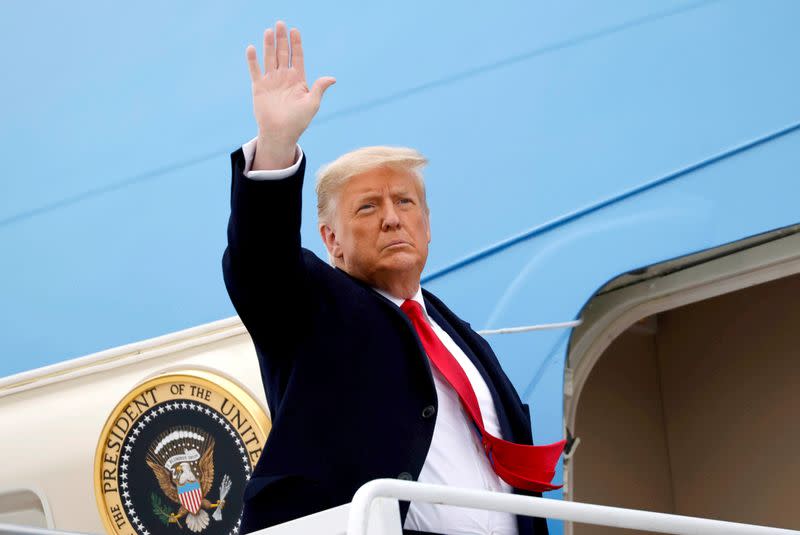 FILE PHOTO: U.S. President Donald Trump returns after visiting the U.S.-Mexico border wall, in Texas