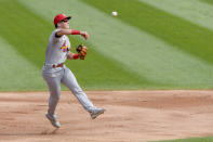 St. Louis Cardinals shortstop Tommy Edman (19) makes a throw to first for the out on Chicago White Sox Yoan Moncada (10) during the first inning in Game 2 of a double-header baseball game Saturday, Aug. 15, 2020, in Chicago. (AP Photo/Mark Black)