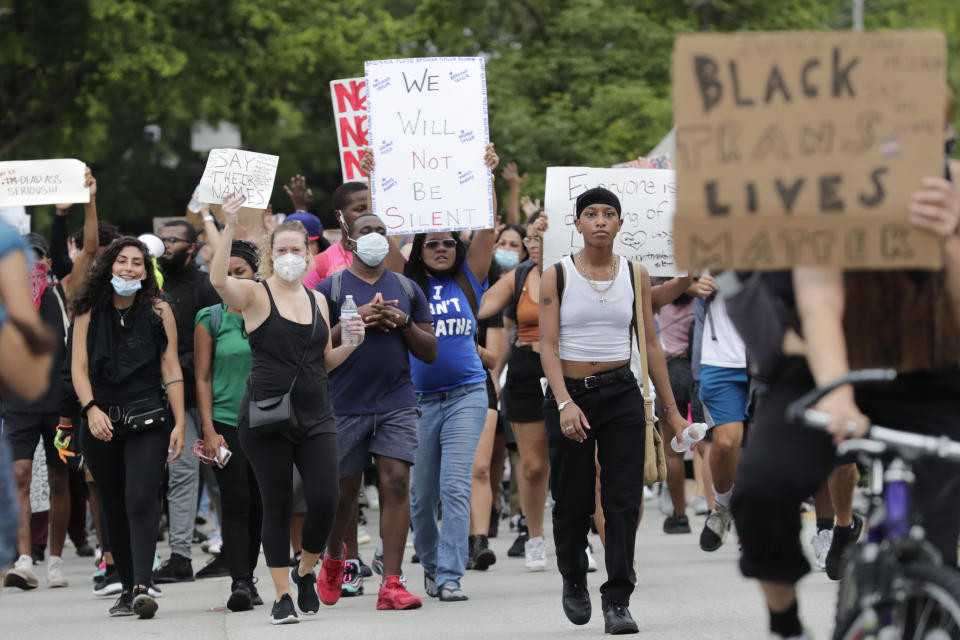 Protesters march through the streets over the death of George Floyd, Tuesday, June 2, 2020, in Miami. Protests were held throughout the country over the death of Floyd, a black man who died after being restrained by Minneapolis police officers on May 25. (AP Photo/Lynne Sladky)