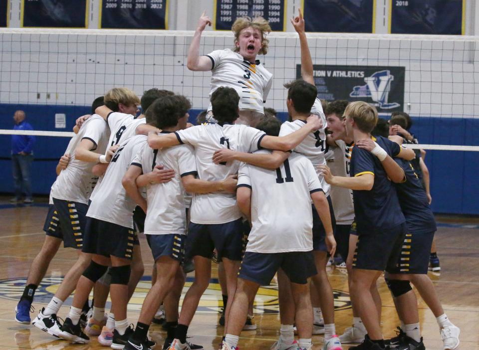 Spencerport's Shaun Cannon (3), center top, gets his teammates pumped up before taking the court to face Brockport during their Class B boys volleyball championship finals Thursday, Nov. 10, 2022 at Victor High School.