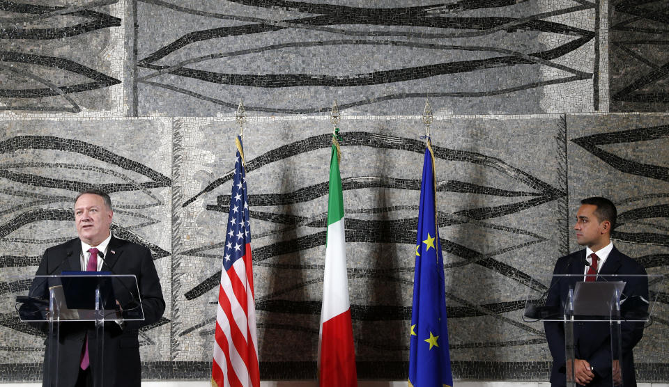 U.S. Secretary of State Mike Pompeo, left, speaks at a joint news conference with Italian Foreign Minister Luigi Di Maio in Rome, Wednesday, Sept. 30, 2020. Pompeo is in Italy as part of his six-day trip to Southern Europe. (Guglielmo Mangiapane/Pool Photo via AP)