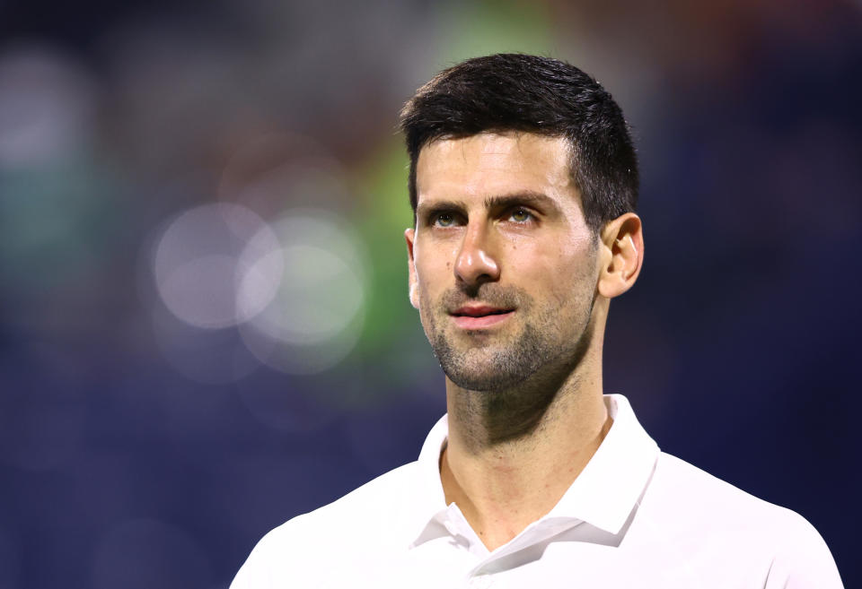 DUBAI, UNITED ARAB EMIRATES - FEBRUARY 21:  Novak Djokovic of Serbia looks on against Lorenzo Musetti of Italyduring day eight of the Dubai Duty Free Tennis at Dubai Duty Free Tennis Stadium on February 21, 2022 in Dubai, United Arab Emirates. (Photo by Francois Nel/Getty Images)