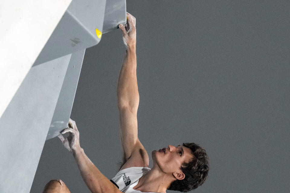 FILE - Nathaniel Coleman, of the United States, competes during the bouldering portion of the men's sport climbing final at the 2020 Summer Olympics, on Aug. 5, 2021, in Tokyo, Japan. Sport climbing's popularity has risen in recent years as more climbers have turned out to scale walls indoor and out. (AP Photo/Gregory Bull, File)