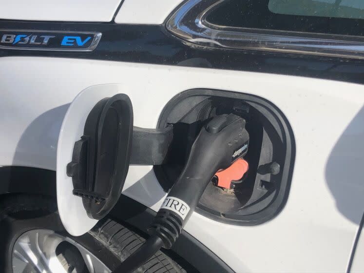 An electric vehicle at a charging station at Chula Vista City Hall in March 2021.