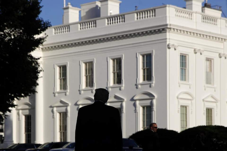 President Donald Trump returns to the White House after visiting outside St. John's Church, Monday, June 1, 2020, in Washington. Part of the church was set on fire during protests on Sunday night. (AP Photo/Patrick Semansky)