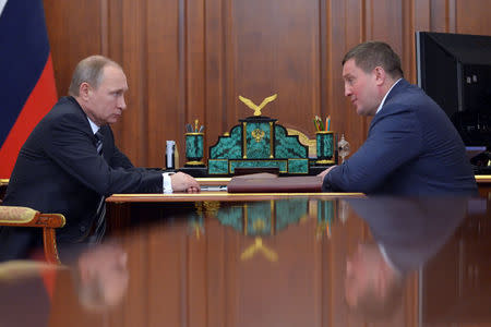 Russian President Vladimir Putin meets with Andrei Bocharov, the governor of the Volgograd region, at the Kremlin in Moscow, Russia, February 9, 2016. Sputnik/Kremlin/Alexei Druzhinin/via REUTERS