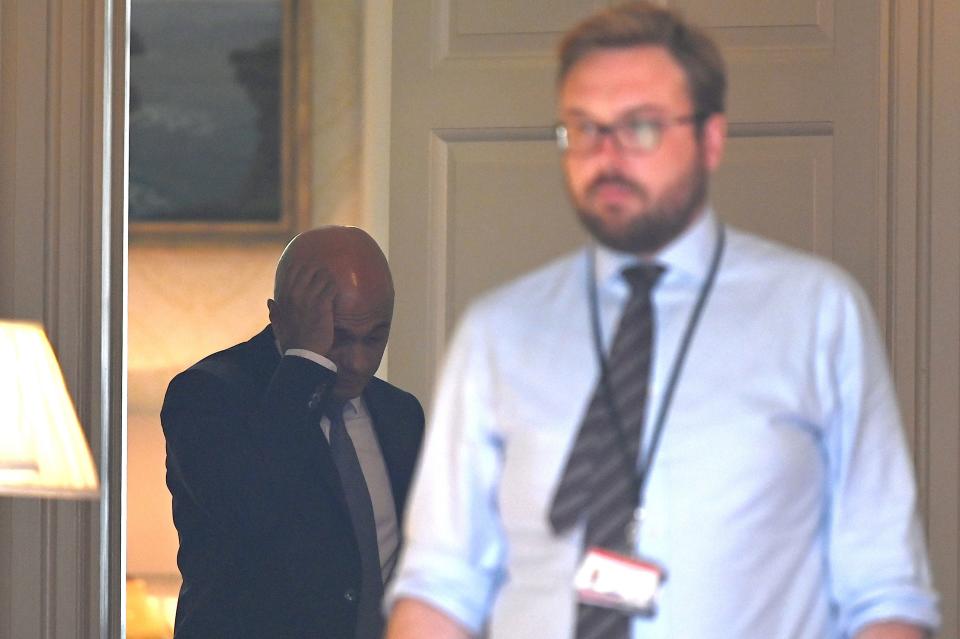 A picture taken from the street looking through the open door of 11 Downing Street in central London on August 28, 2019 shows Britain's Chancellor of the Exchequer Sajid Javid (L) inside 11 Downing Street. - British Prime Minister Boris Johnson announced Wednesday that the suspension of parliament would be extended until October 14 -- just two weeks before the UK is set to leave the EU -- enraging anti-Brexit MPs. (Photo by DANIEL LEAL-OLIVAS / AFP)        (Photo credit should read DANIEL LEAL-OLIVAS/AFP/Getty Images)