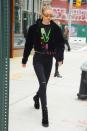 <p>In a neon graphic sweatshirt under a black cropped hoodie with distressed black denim, lace-up boots and copper mirrored sunglasses while out in New York City. </p>