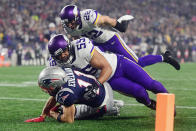 <p>Julian Edelman #11 of the New England Patriots is tackled short of the goal line by Anthony Barr #55 and Harrison Smith #22 of the Minnesota Vikings during the first half at Gillette Stadium on December 2, 2018 in Foxborough, Massachusetts. (Photo by Adam Glanzman/Getty Images) </p>