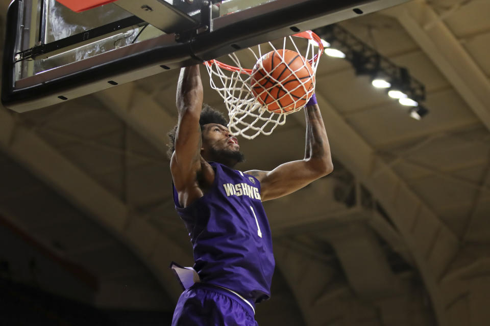 Washington forward Keion Brooks Jr. (1) dunks against Oregon State during the second half of an NCAA college basketball game Saturday, Feb. 10, 2024, in Corvallis, Ore. Washington won 67-55. (AP Photo/Amanda Loman)