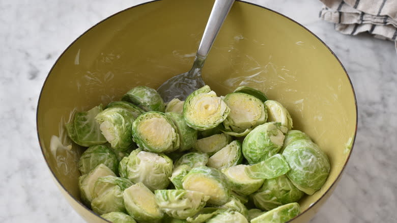 Brussels sprouts mixed with oil and mayonnaise