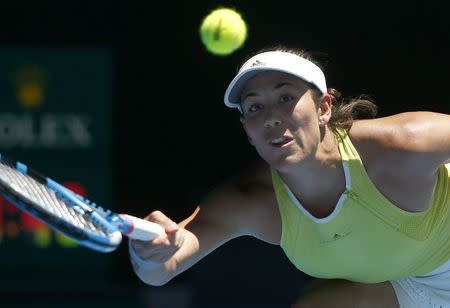 Tennis - Australian Open - Rod Laver Arena, Melbourne, Australia, January 18, 2018. Garbine Muguruza of Spain hits a shot against Hsieh Su-Wei of Taiwan. REUTERS/Thomas Peter