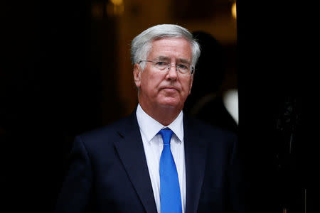 Britain's Secretary of State for Defence Michael Fallon leaves after attending a cabinet meeting at Number 10 Downing Street in London, Britain September 8, 2015. REUTERS/Stefan Wermuth/File Photo