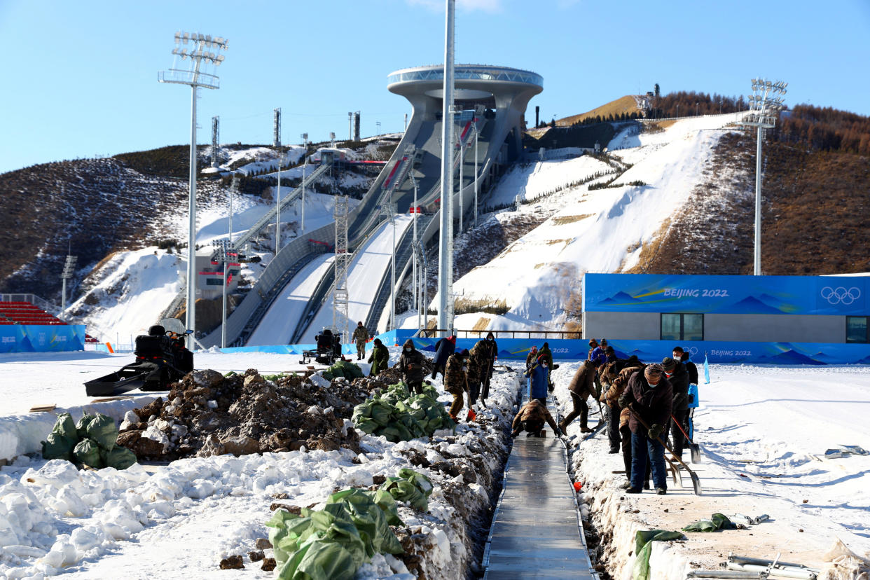 Image: The National Biathlon Centre and National Ski Jumping Centre, competition venues for Biathlon and Ski Jumping during the Beijing 2022 Winter Olympics, are seen in Beijing (Pawel Kopczynski / Reuters)