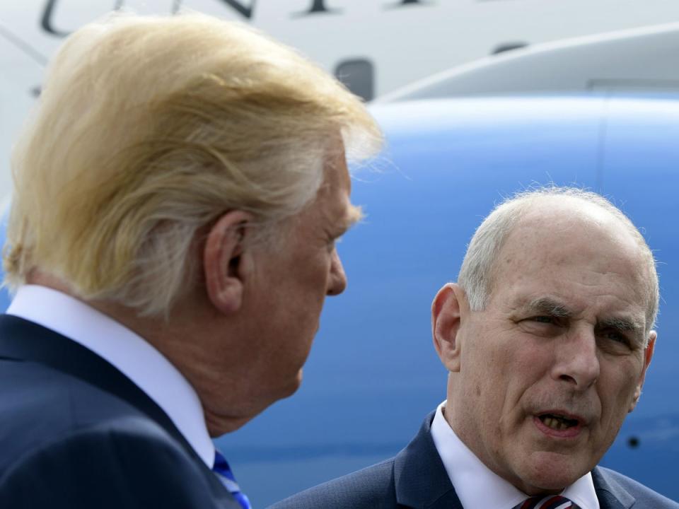 White House Chief of Staff John Kelly speaks to reporters as Donald Trump listens before boarding Air Force One (AP Photo/Susan Walsh)