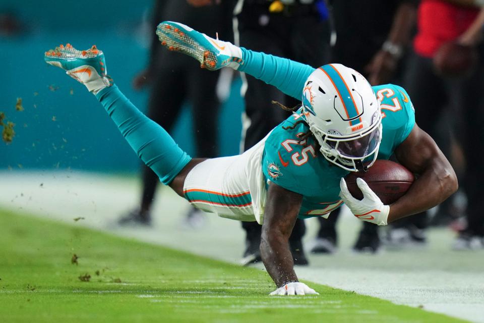 Jaylen Wright #25 of the Miami Dolphins runs the ball against the Atlanta Falcons during the second quarter in a preseason game at Hard Rock Stadium on August 9, 2024 in Miami Gardens, Florida. (Photo by Rich Storry/Getty Images)