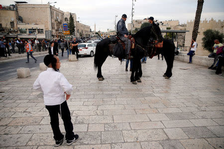 Mounted Israeli police is seen deployed outside Jerusalem's Old City's Damascus Gate, following an incident inside Jerusalem's Old City, March 18, 2018. REUTERS/Ammar Awad