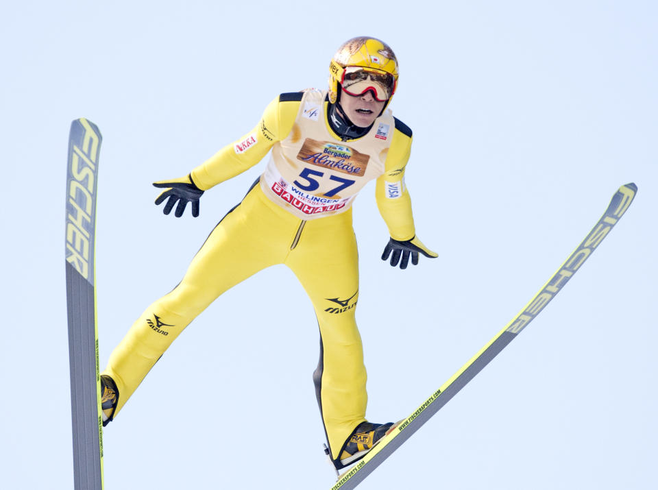 Fourth placed Noriaki Kasai of Japan soars through the air during the FIS World Cup ski jumping in Willingen, Germany, Sunday, Feb. 2, 2014. (AP Photo/Jens Meyer)