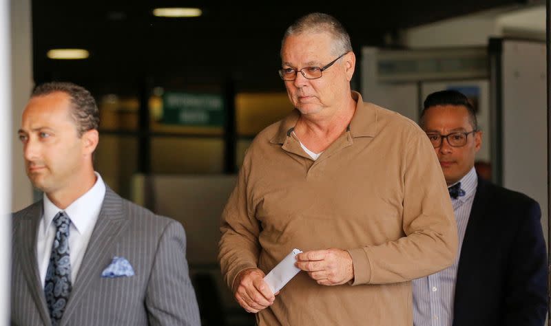 FILE PHOTO: Former Broward County Sheriff's deputy Scot Peterson leaves Broward County Jail with his attorneys Joseph DiRuzzo (R) and David Sobel after his release in Fort Lauderdale, Florida