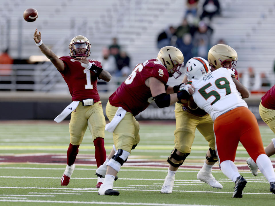 Boston College quarterback Thomas Castellanos (1) passes the ball during the second half of an NCAA college football game against Miami, Friday, Nov. 24, 2023, in Boston. (AP Photo/Mark Stockwell)