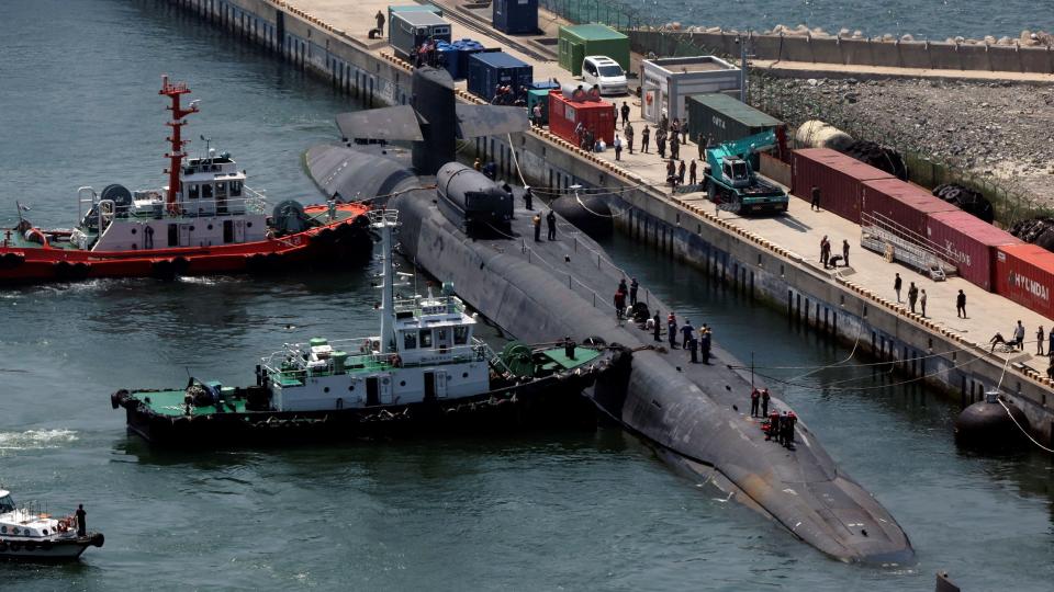 The U.S. nuclear-powered submarine USS Michigan is anchored at a port in Busan, South Korea, on June 16, 2023.