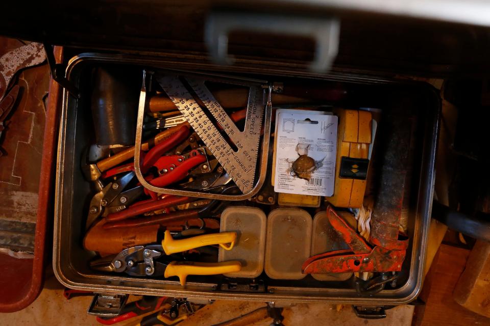 The tools folk artist Chris Hubbard uses to make his art in his workshop at his home in Farmington, Ga., on Wednesday, Oct. 5, 2022.