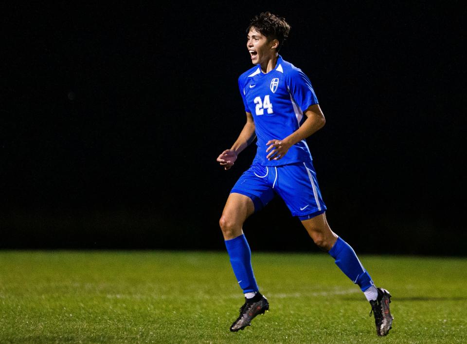 Marian's Angel Pereira celebrates after winning the Marian vs. Saint Joseph soccer match Wednesday, Sept. 29, 2021 at Marian High School. 