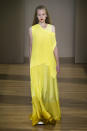 <p><i>Model wears a yellow maxi dress from the SS18 Agnona collection. (Photo: ImaxTree) </i></p>