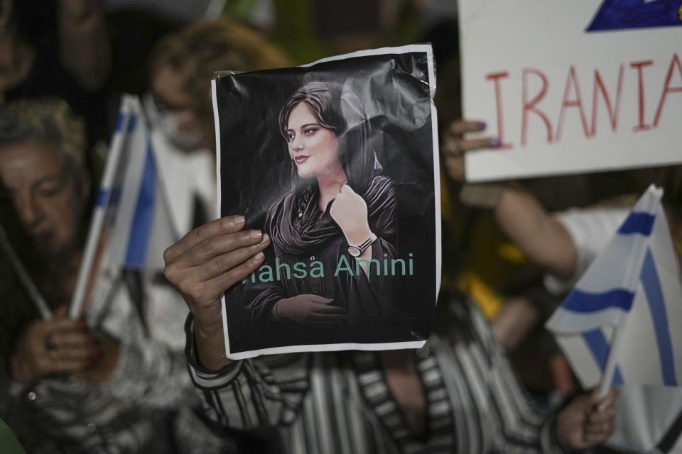 Women attend a protest against the death of Mahsa Amini, a woman who died while in police custody in Iran, during a rally in Tel Aviv, Israel, Oct. 29, 2022. / Credit: AP Photo/Ariel Schalit