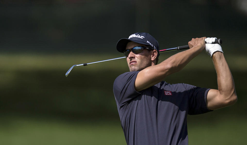 Adam Scott hits from the fairway on the fifth hole during the first round of the Arnold Palmer Invitational golf tournament at Bay Hill Thursday, March 20, 2014, in Orlando, Fla. (AP Photo/ Willie J. Allen Jr.)