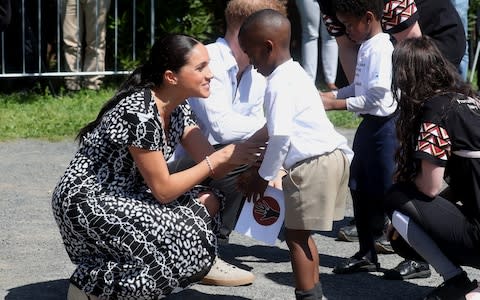 Harry and Meghan arrive in Nyanga - Credit: Getty