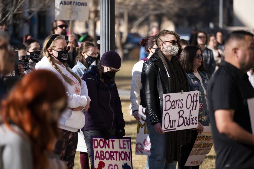 People protest a lawsuit to ban the abortion drug mifepristone at the Potter County Courthouse Saturday, Feb. 11, 2023, in Amarillo, Texas. (AP Photo/Justin Rex)